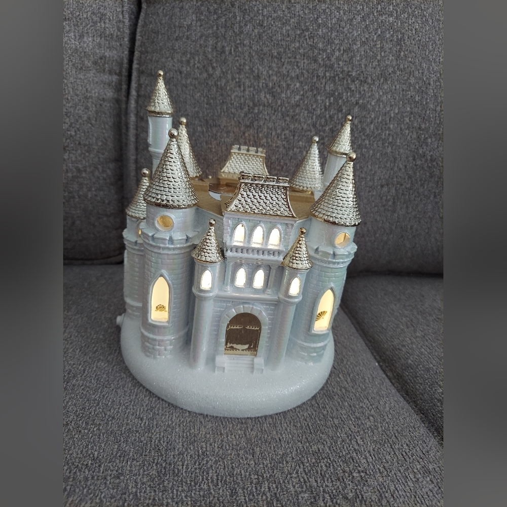 Disney princess castle candle pedestal by bath and body works.